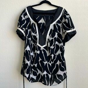 elegant black and white short sleeve blouse with waist tie